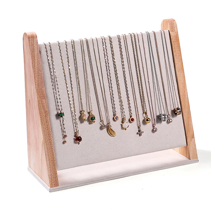 Stojánek, stojan, dekolt na řetízky bílá