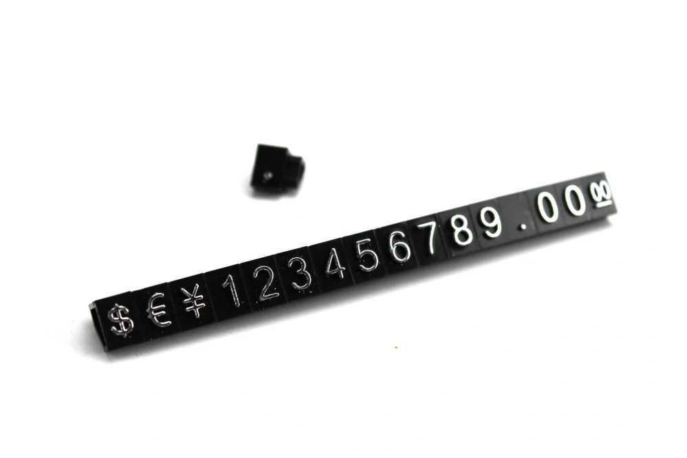 Plastové cenovky stříbrný prolis 6x9mm 20x řada €,$,¥