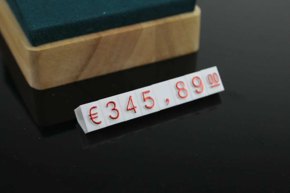 Plastové cenovky červené, bílé 6x9mm 20x řada €,$,¥
