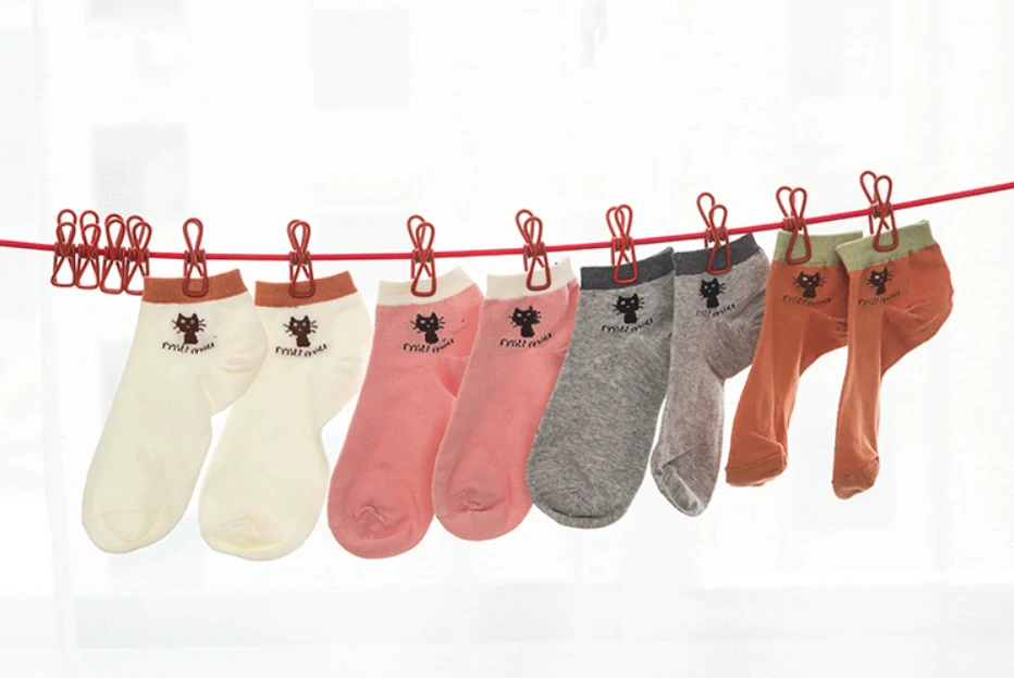 Cestovní šňůra na prádlo s kolíčky – zelená (nastavitelná)