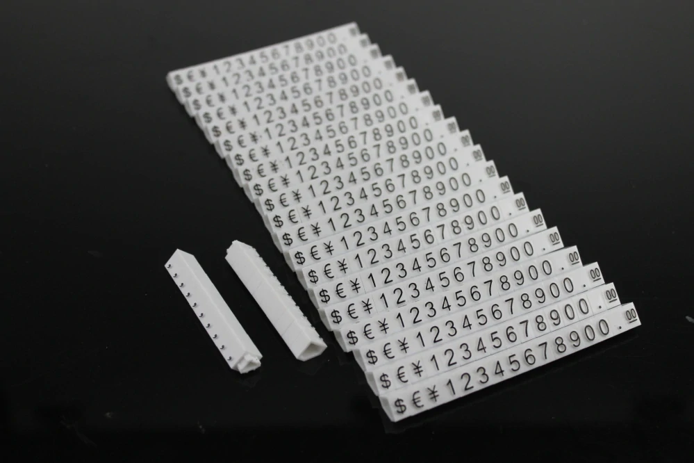 Plastové cenovky černé, bílé 6x9mm 20x řada €,$,¥